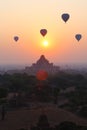 Balloons across the Bagan in sunrise